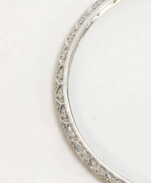 Örhängen, ett par. 14K vittguld med ca 60 st diamanter ca 0,6ct.