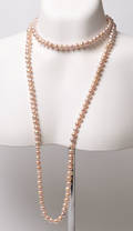 Collier med gl. rosa ferskvands kulturperler L. 125 cm.