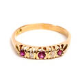 Ring 18k guld med diamanter och rubiner