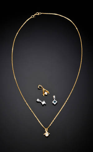 Halskæde med fire vedhæng 5