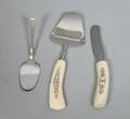 Ostkniv, osthyvel samt kakspade, silver