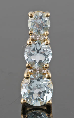 9Kt Diamond and Topaz pendant approx. 0.04ct.