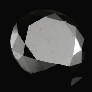 Uindfattet behandlet sort brillant ca. 3.59 ct.