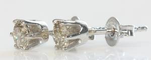 Par brillantørestikker, ca. 0.70 ct. 2