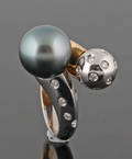 Platinium  18K gold ring with diamonds and tahiti pearl approx. 0.17ct.