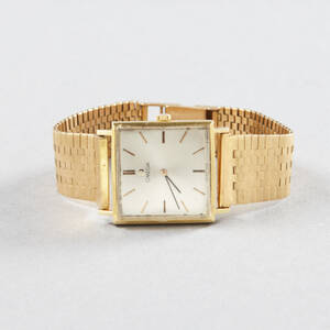 Herrarmbandsur i 18 k guld Omega