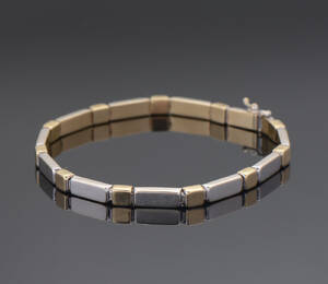 Armbånd af 14 kt. Guld og hvidguld
