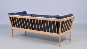 Dansk møbelproducent. Tre-personers tremmesofa i læder