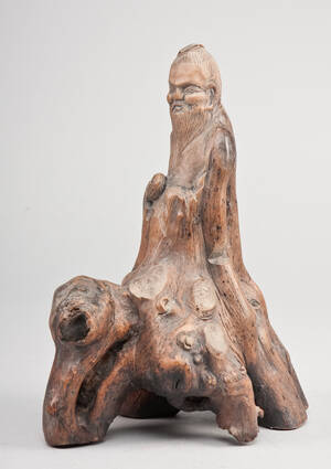 Orientalsk kinesisk figur i rodtræ