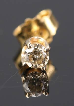 Enkelt brillantørestikker af 14 kt. guld ca. 0.20 ct.