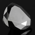 Uindfattet behandlet sort brillant ca. 11.69 ct.