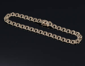 Jos. Kahn. Bismark armlænke af 8 kt. guld. B. 0,5 cm. L.19,8 cm. Vægt ca. 5,8 g