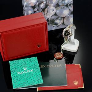 Original Rolex Oyster Perpetual damearmbåndsur med brillanter.