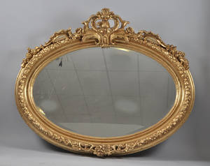 Förgylld spegel i rokokostil