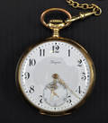 Longines. Fickur i 18K guld