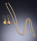 Par ørelokker samt kæde af  14 kt guld 3