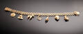 Armband med berlocker i 18 k guld