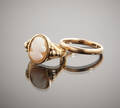 Ring i 23 k guld vigselring i 18 k guld