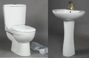 Coco. Håndvask med søjle samt sparetoilet.