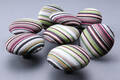 Otte store knager med Paul Smith stof Ø 9,5 cm., model DOT 8 