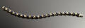 Armband i 14 k guld safirer diamanter