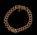 Armband i 18 k guld manglad pansar