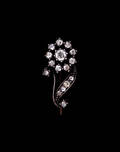 Brosch silver och guld rosenstenar