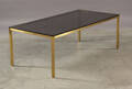 Sofabord med stel af aluminium, bordplade af sort mat glas. 