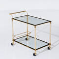Serveringsvagn av mässing och glas