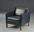 Møbelproducent. Lænestol, sort læder