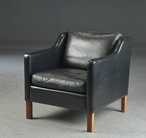 Møbelproducent. Lænestol, sort læder