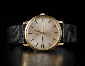 Omega Genève. Herrur i 14K guld