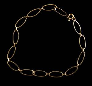 Armband och ring i guld