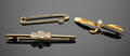 Tre vintage guld brocher