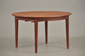 Dansk møbelproducent Rundt spisebord af teak med 4 tillægsplader, 1960erne 5