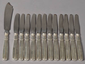 Lotus - 12 middagsknive  1 kageknive i sølv fra Horsens Sølvvarefabrik. 13