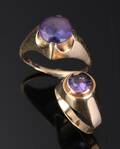 To ringe af 14 kt guld med syntetiske lilla safirer 2