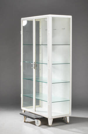 Tandlægeskab af hvidlakeret metal og glas