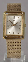 Omega Automatic herreur i 14 kt guld.