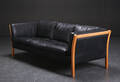 Stouby. Tre-pers. sofa, sort læder