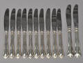 Cohr - tolv Herregård knive i sølv. 12