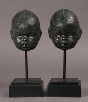 Børnemasker udført i bronze 2
