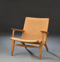 Hans J. Wegner. Lænestol model CH25 af massivt eg