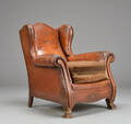 Øreklapstol, brunt læder.