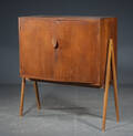 Skab af teak, ben af bøgetræ, 1950erne
