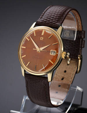 Omega Seamaster. Vintage herreur i 14 kt. guld med gylden skive, ca. 1963