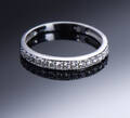 Alliancering af 14 kt guld, 0.27 ct.