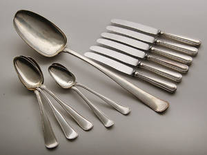 Dobbeltriflet bestik af sølv. 12