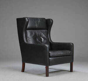 Stouby Møbler. Øreklapstol, sort læder 
