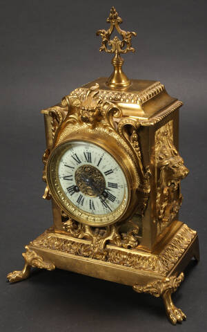 Fransk Kaminur af forgyldt metal. 1900 tallet. Denne vare er sat til omsalg under nyt varenummer 4117227